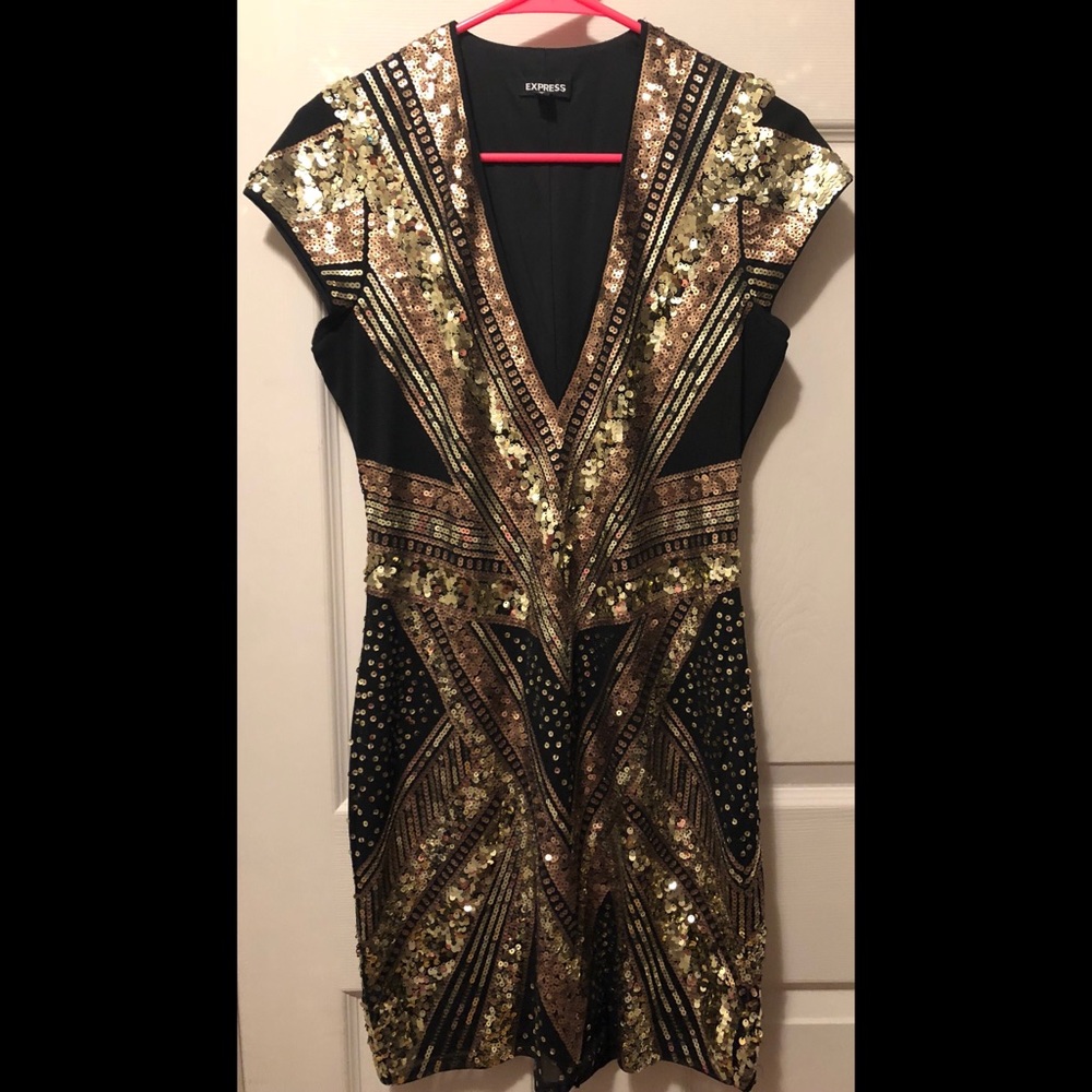 **Monday's Highlighted Listing** Black and gold mini dress from Express